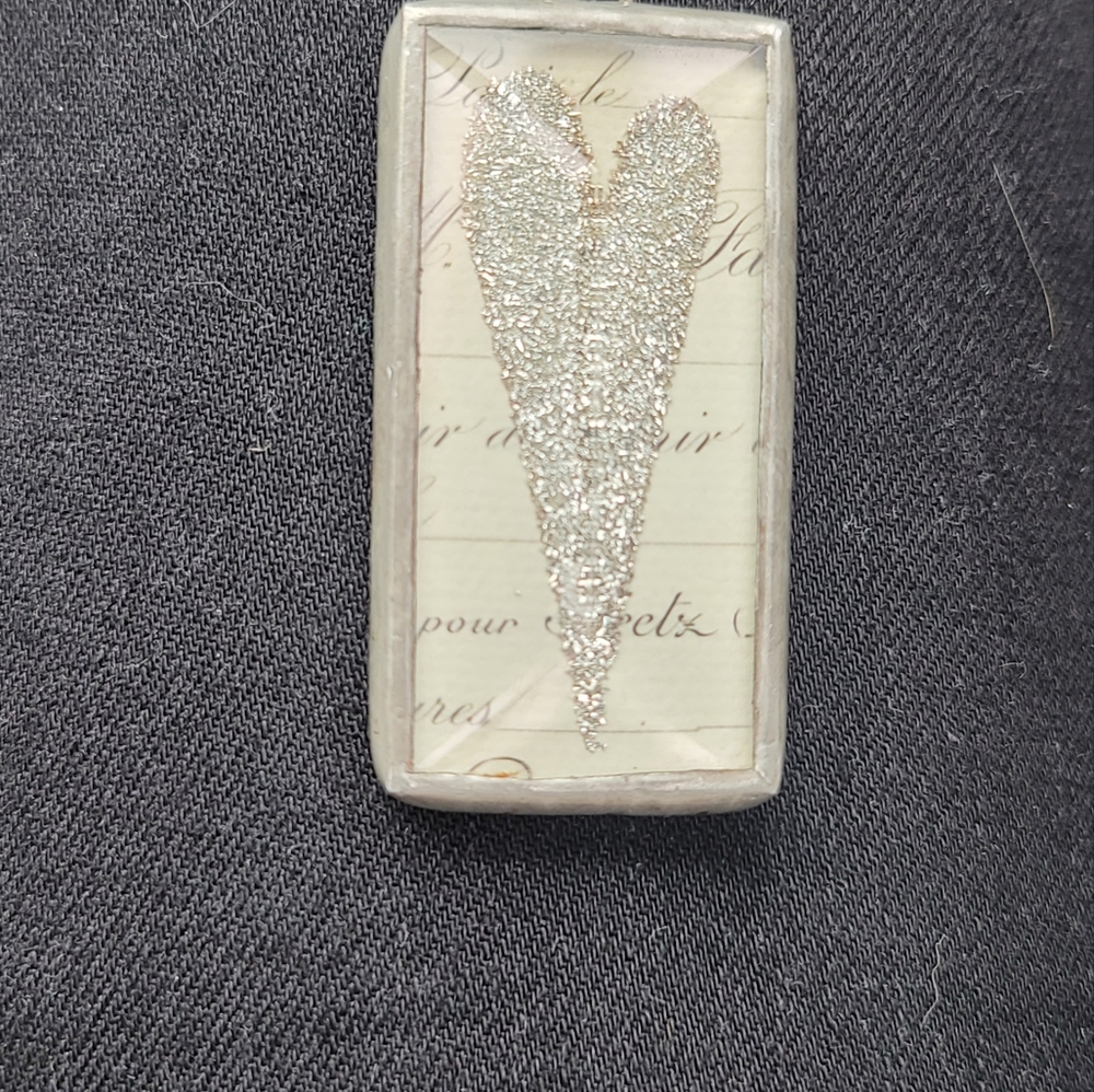Jewel Kade pendant sparkle heart/hear w key hole “follow your heart “